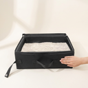 Black foldable travel litter box for cats, scale photo