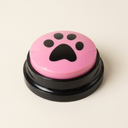 Pink recordable talking dog button on a cream background
