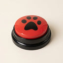 Red recordable talking dog button on a cream background